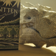 Illustration for article titled Artist Turns emThe Hobbit/em Book Into Paper Sculpture Of Smaug